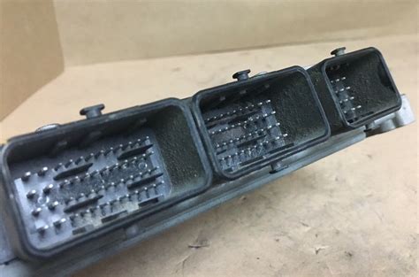 Rezultat imagine pentru 2012 Jeep GC SRT8 Powertrain Control Module Location