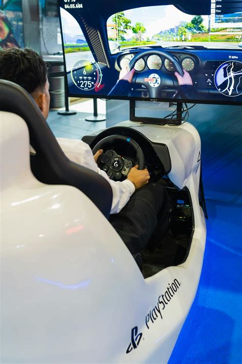 Image result for Man Driving a Racing Simulator