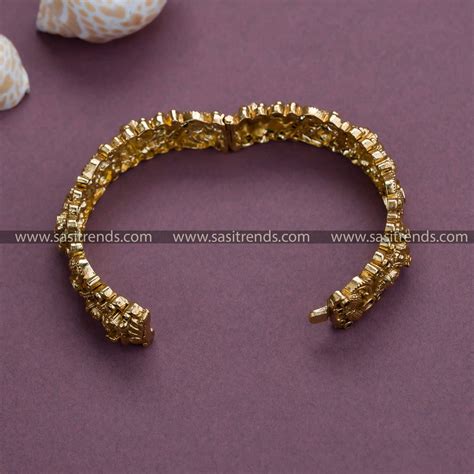 Latest Matt Gold Tone Lakshmi & Peacock Kada Bangle for Online Shopping ...