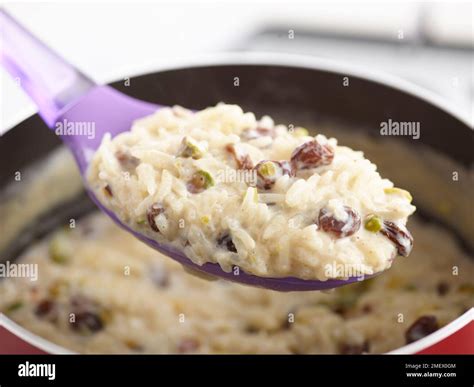 steps for indian rice pudding, step 3 Stock Photo - Alamy