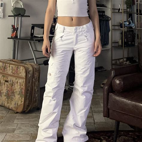 White snow pants by The North Face. Women’s S, long... - Depop