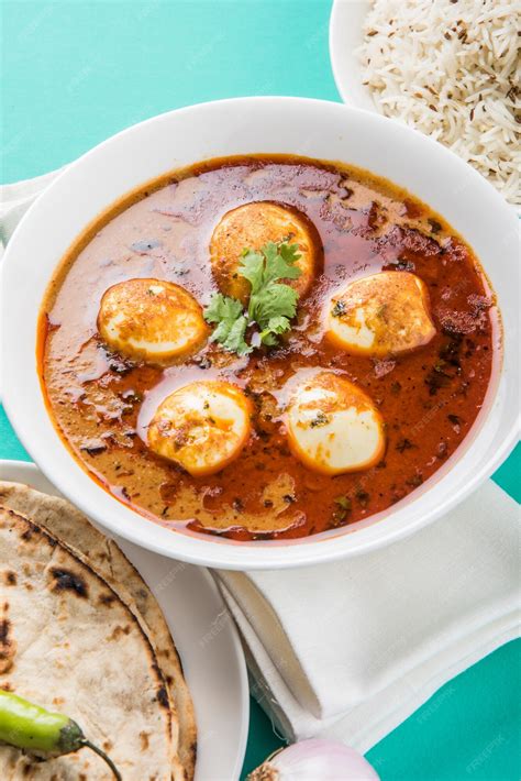 Anda curry or egg masala gravy, indian spicy food or recipe, served ...