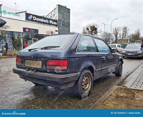 Classic Veteran Vintage 3-door Hatchback Metal Blue Car Old Mazda 323 Facing Right Editorial ...