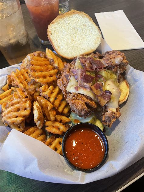 Facemelter at my local dive bar. Fried chicken, bacon, pepper Jack ...