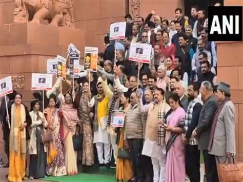 Parliament: BJP MPs protest against Congress amid chaos over Shah's ...