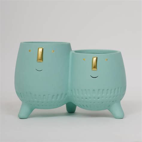 Buy Hello Spring Ceramic Face Planter from Home Centre at just INR 399.0