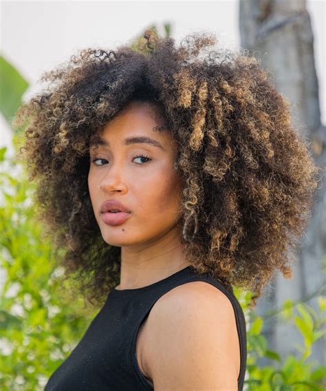 Curly Dark Brown Hair With Highlights