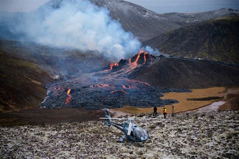 Lava flows from the erupting Fagradalsfjall volcano some 40 km west of ...