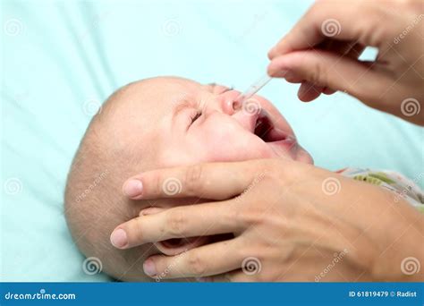 Mother Treats the Baby Runny Nose Stock Image - Image of head ...