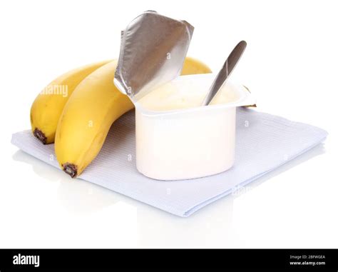 Yogurt with banana isolated on white Stock Photo - Alamy