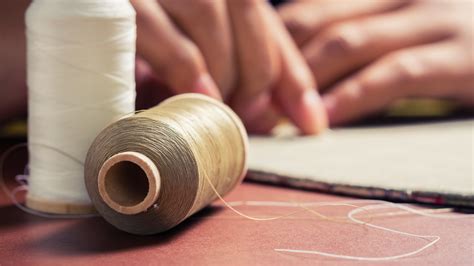 Image result for How to Use Large Thread Spool On Machine