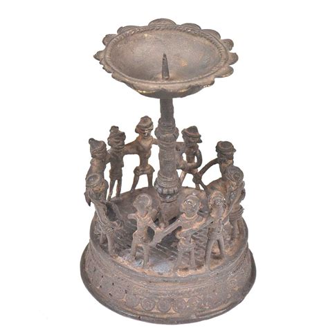 Brass Tribal Folk Dance around A Tall Candleholder