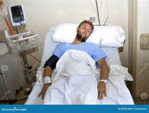 Injured Man Lying in Bed Hospital Room Resting from Pain Looking in Bad ...