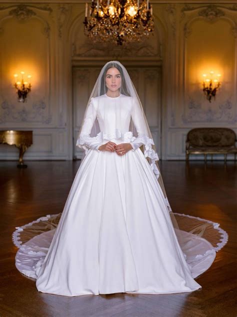 Olivia Culpo in Dolce & Gabbana at her wedding to Christian McCaffrey ...