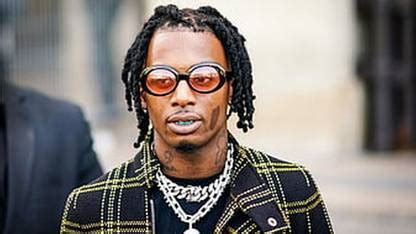 HD wallpaper playboi carti twisting hair is wearing black yellow ...
