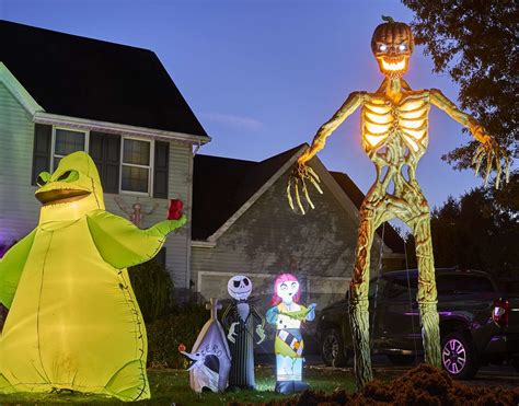 12-foot-tall skeletons do more than just scare - Butler Eagle