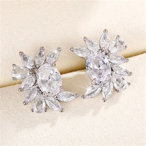 Silver Plated American Diamond Studded Crushed Ice Cut Stud Earrings ...
