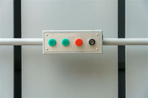 Multicolored mechanical buttons and a keyhole for turning on the ...