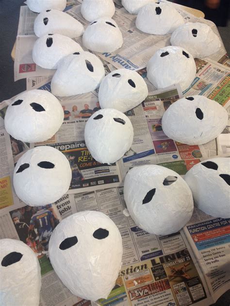 Blow up a balloon. Paper mache' it. 3 layers. Dry between layers. Cut ...