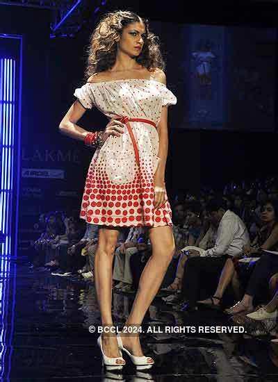 A model showcases a creation by designer Rocky S on Day 5 of the Lakme ...