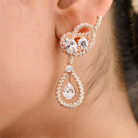 Buy METALM Metal Cz Diamond Drop Studded Earrings Online