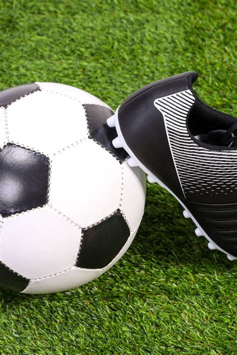 Download wallpaper 800x1200 soccer ball, boot, grass, sports, football ...