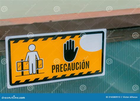 Sticker with Caution Text Stuck on Glass Stock Image - Image of access ...