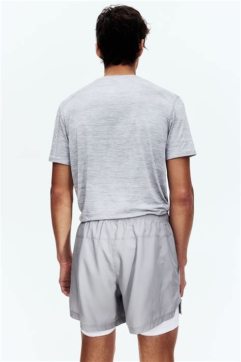 Double-layered sports shorts with DryMove™ - Grey - Men | H&M IN