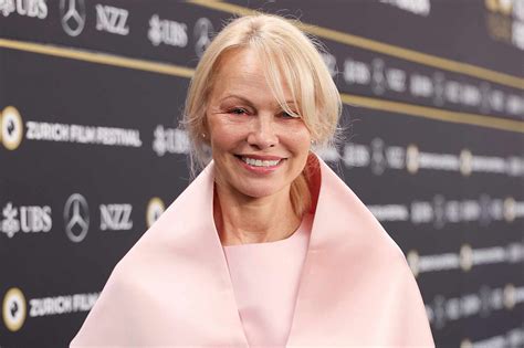 Pamela Anderson Is Pretty in Pink with Natural Look During Film Festival