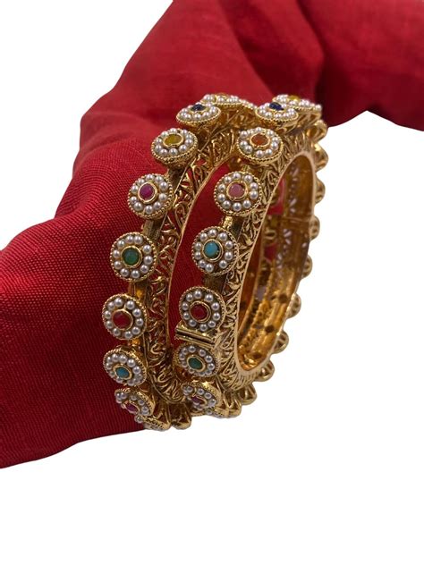 Saavi Multi Color Antique Golden Pacheli Bangles Online By Gehna Shop