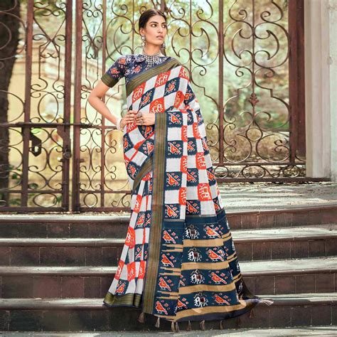 White Patola Printed Cotton Silk Saree With Tassels