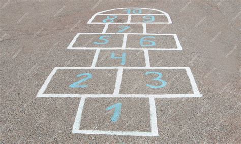 Premium Photo | Children's game drawn with chalk on the asphalt. Game ...