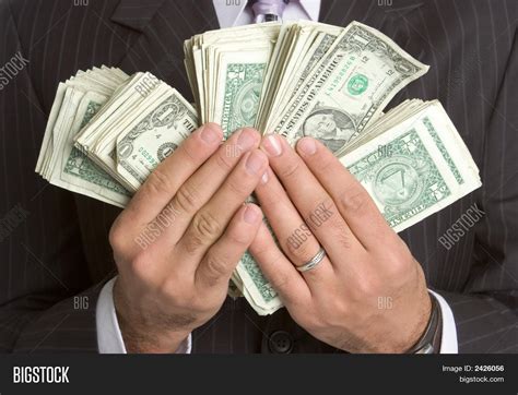 Hands Holding Money Image & Photo (Free Trial) | Bigstock