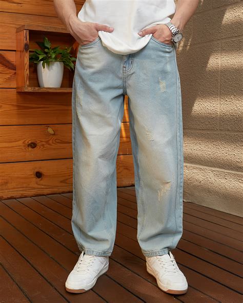 Buy Men's Light Blue Washed Baggy Fit Distressed Jeans Online in India ...