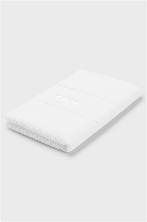 BOSS - Cotton guest towel with white logo embroidery - White