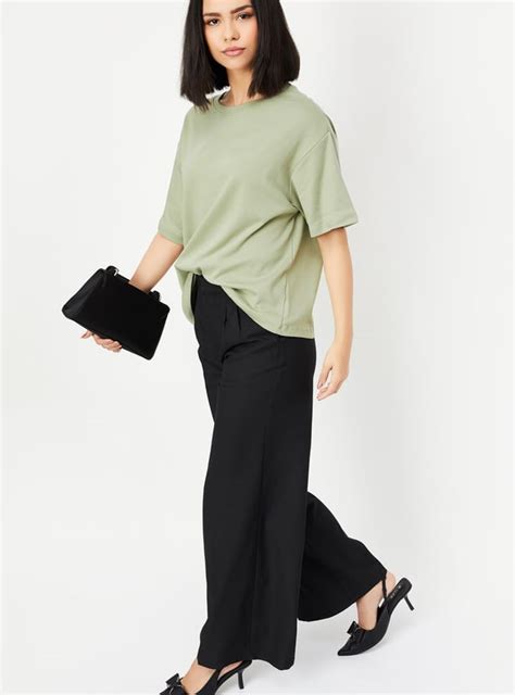 Buy Women Solid Oversized Boxy T-shirt Online at just Rs. 399.0 ...
