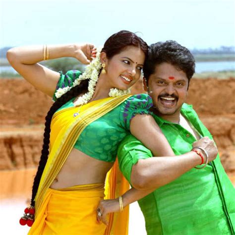 Karan and Thirupta in a still from the Tamil movie Kanniyum Kaalaiyum ...