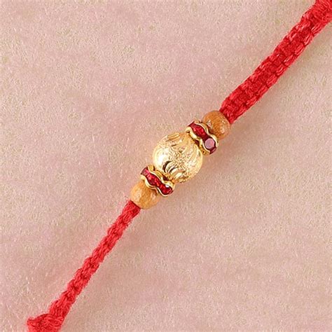 Send White Moti Traditional Rakhi Thread Online