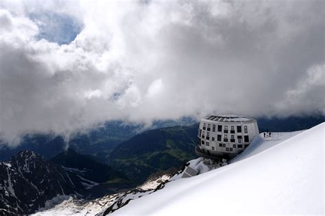 13 stunning buildings standing alone on mountaintops | Architectural ...