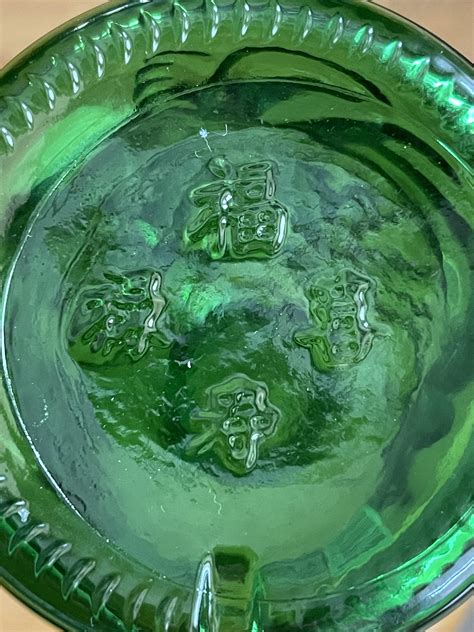 [Chinese u003e English] The characters on the bottom of a Lucky Buddha beer ...