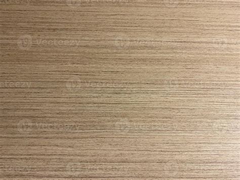 Light-colored laminate floor with a smooth finish, perfect for ...