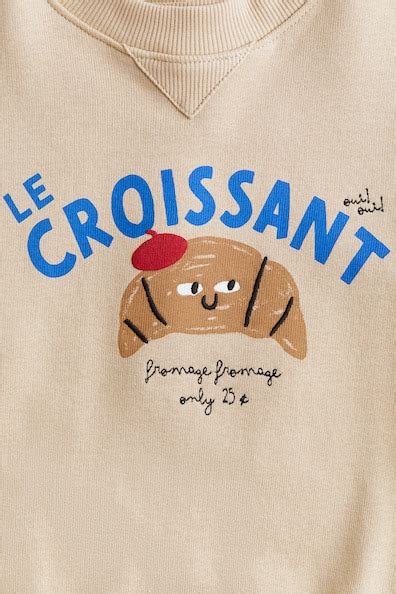 Printed crew-neck sweatshirt - Beige/Le Croissant - Kids | H&M IN