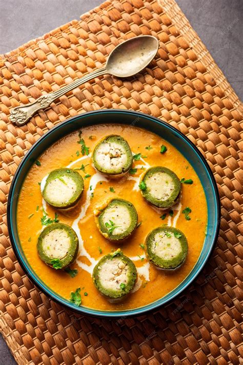 Premium Photo | Shaam savera is a spinach kofta curry where stuffing is ...