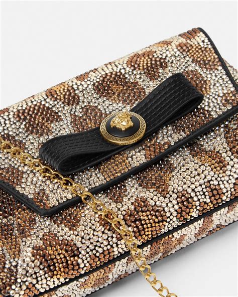 Leopard Gianni Ribbon 크리스탈 클러치 블랙,골드 | VERSACE KR