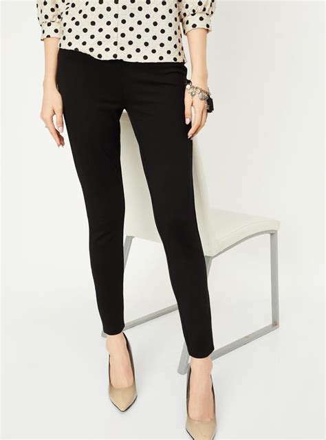 Buy Women Solid Button Accent Treggings Online at just Rs. 999.0 ...