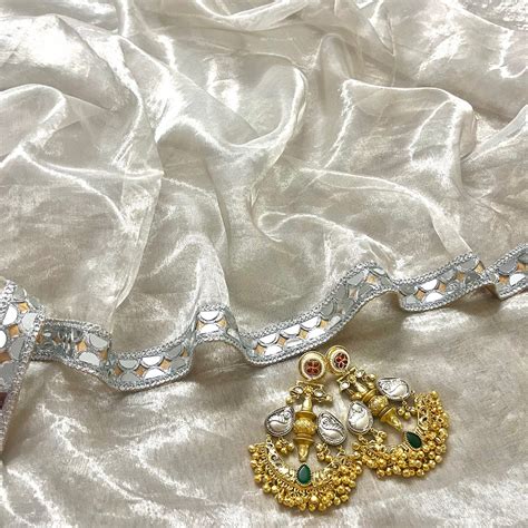 Molten silver and gold chanderi tissue silk saree with mirror work bor ...