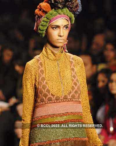 Nina Manuel displays a creation by Indian designer Sabyasachi Mukherjee ...