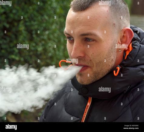 A 27 year old man vaping UK Stock Photo - Alamy
