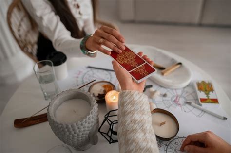 High angle woman reading tarot at home | Free Photo