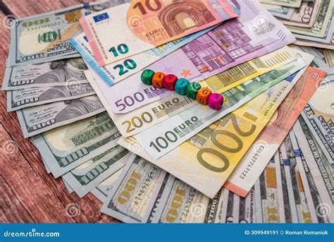 Savings Word in Wooden Cubes with Euros and Dollar Bills Stock Image ...